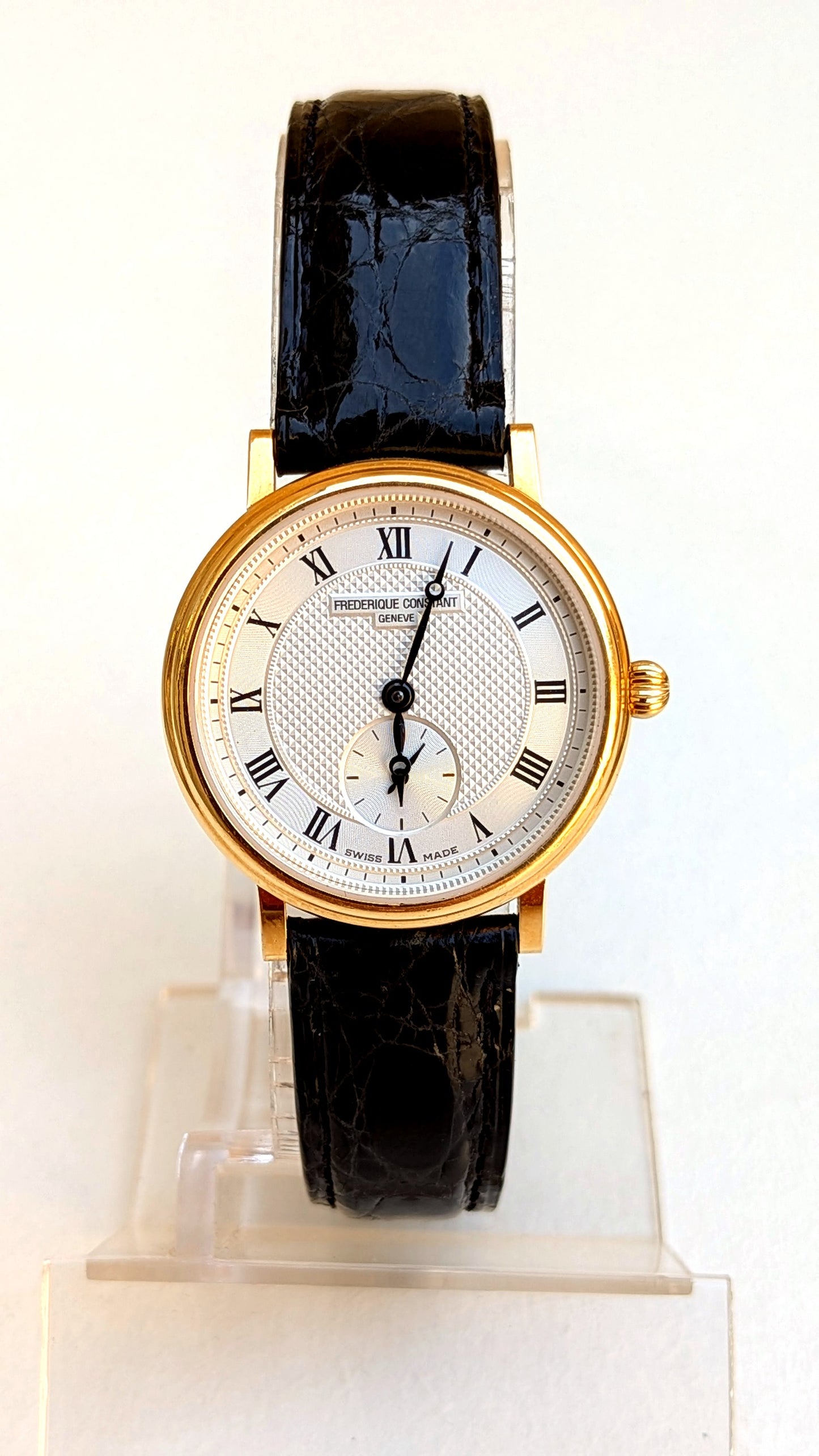 Frédérique Constant Slimline or 18 ct, cadran guilloché, petite seconde à 6h, cuir noir, montre habillée femme