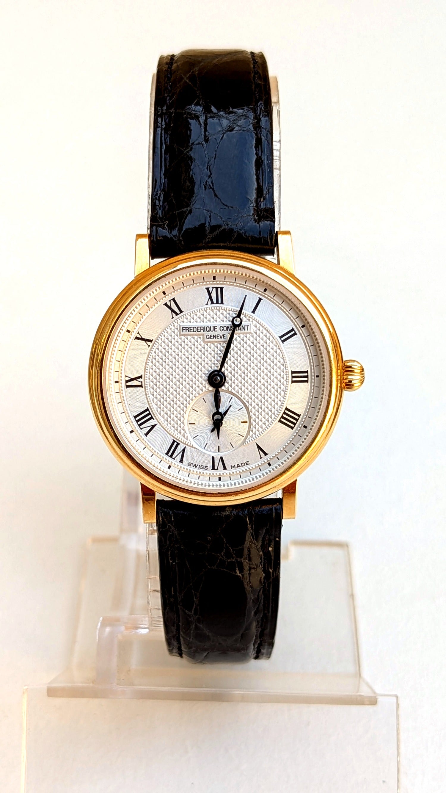 Frédérique Constant Slimline or 18 ct, cadran guilloché, petite seconde à 6h, cuir noir, montre habillée femme