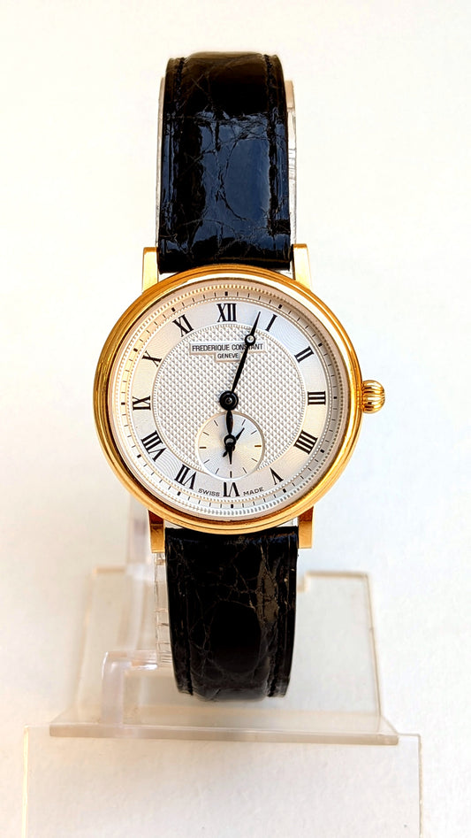 Frédérique Constant Slimline or 18 ct, cadran guilloché, petite seconde à 6h, cuir noir, montre habillée femme