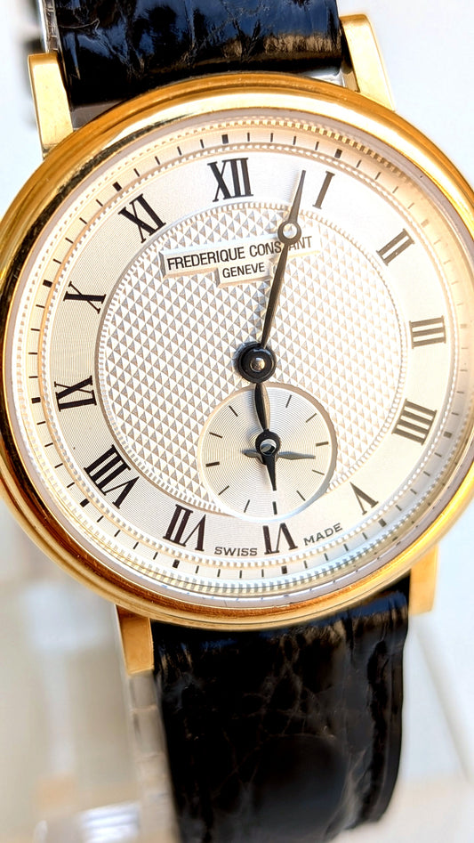 Frédérique Constant Slimline or 18 ct, cadran guilloché chiffres romains et petite seconde à 6h, montre habillée femme