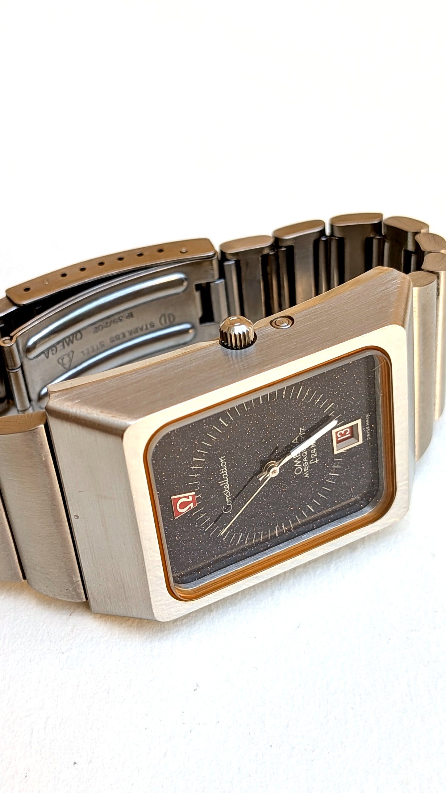 Omega Constellation Megaquartz vue plongeante couronne, fermoir gravé Stainless Steel Omega, montre vintage homme