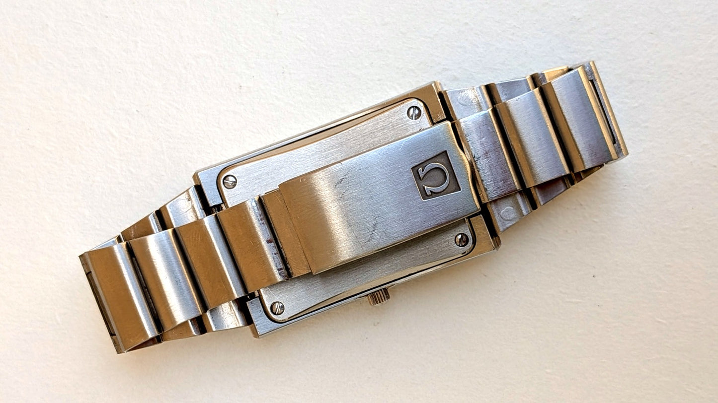 Omega Constellation Megaquartz fond de boîte et fermoir acier logo Oméga, bracelet intégré, montre vintage homme